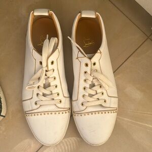 Christian Louis Vuitton low top sneakers
￼ good condition